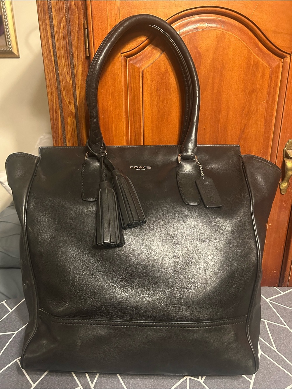 Coach Black Leather Satchel with Tassel Accents